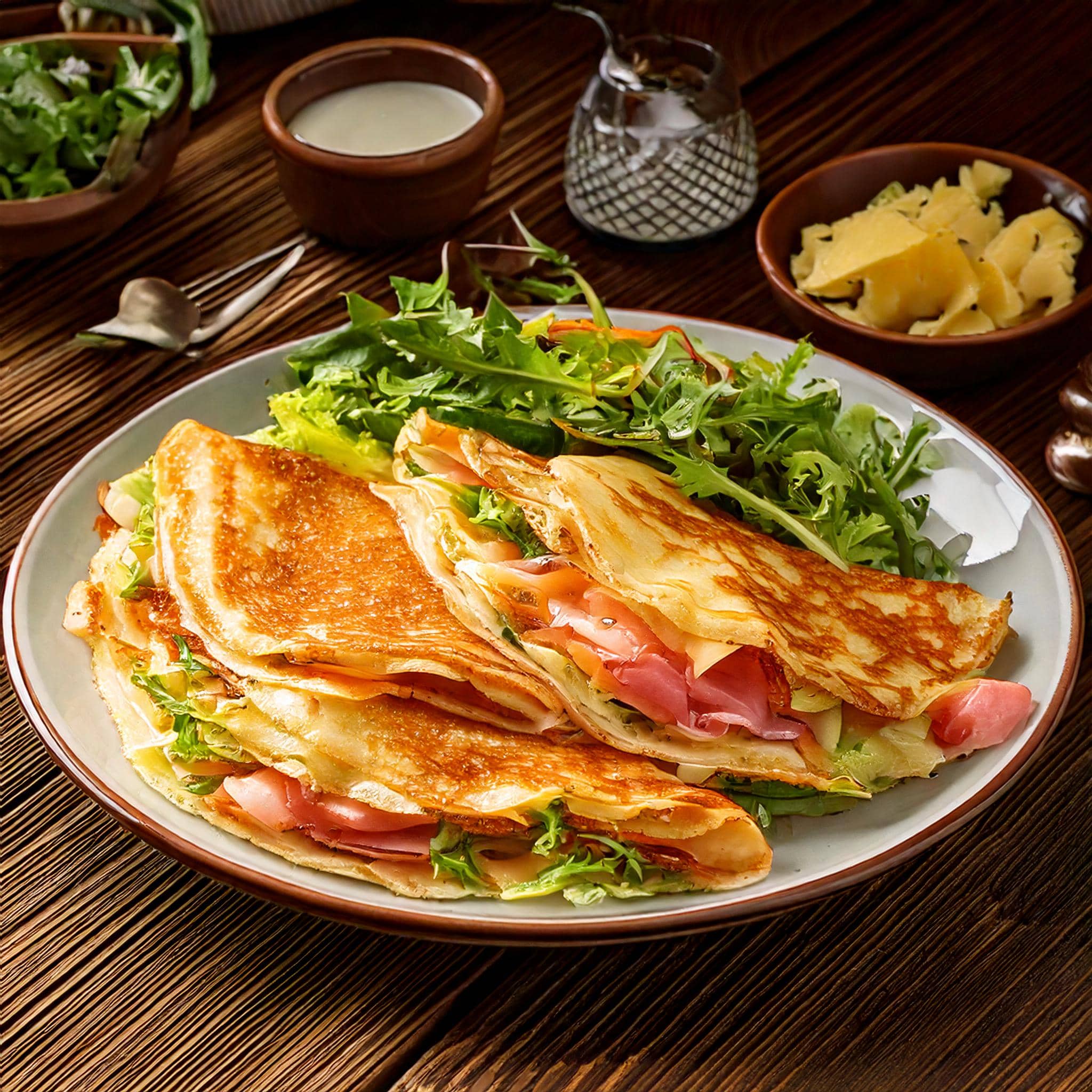 Delicious homemade crêpes with fresh berries and whipped cream