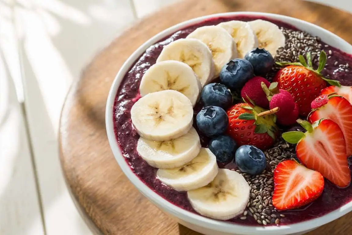 A vibrant acai bowl topped with fresh fruits and seeds, ideal for weight loss.